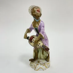 Обезьяна с Харди Гарди 1880 гг