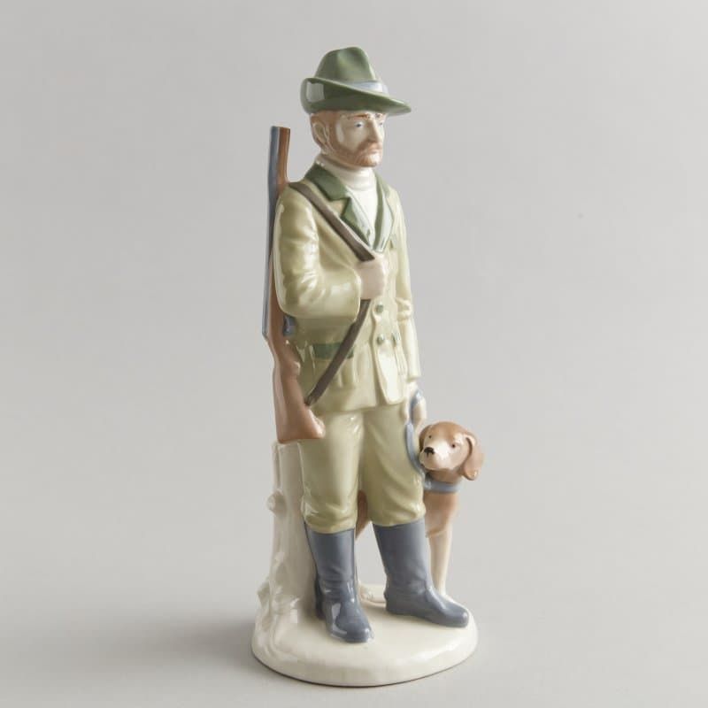 Охотник с собакой