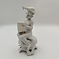 Статуэтка 'Пишущий мальчик' из композитного материала, Азия, конец XX - начало XXI века