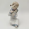 Фарфоровая статуэтка NAO Porcelain «Девушка с куклой», Испания