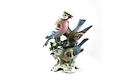 Три птицы на ветке