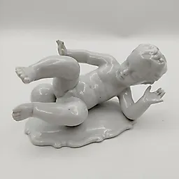 Фарфоровая статуэтка "Путти с мячом", VEB Schaubach Kunst Lichte-Wallendorf, Западная Европа, 1950-е