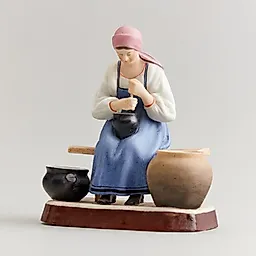 Крестьянка, сбивающая масло