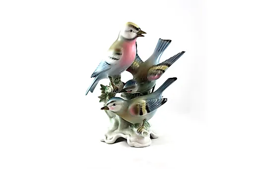 Три птицы на ветке