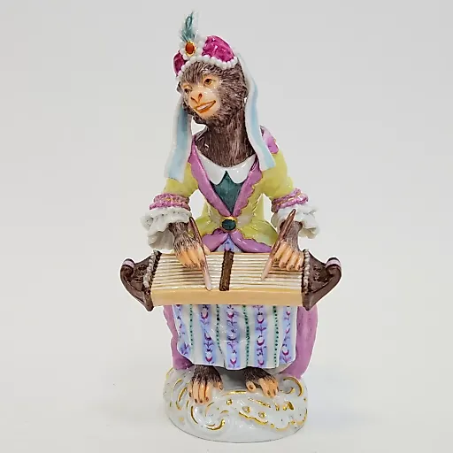 обезьяна с цитрой