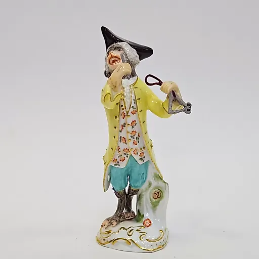 Статуэтка обезьяна с треугольником из обезьянего оркестра