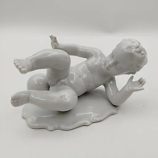 Фарфоровая статуэтка "Путти с мячом", VEB Schaubach Kunst Lichte-Wallendorf, Западная Европа, 1950-е