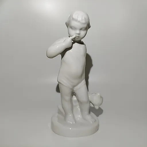 Фарфоровая статуэтка "Мальчик с мишкой" авторства Л. Клименковой-Краузе, Первомайский завод (СССР)