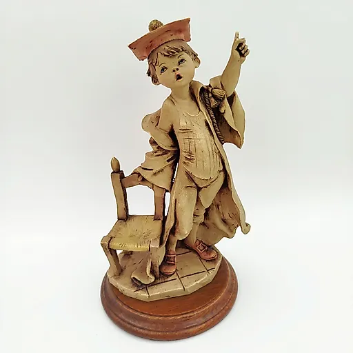 Статуэтка "Студент" из композитного материала с тонировкой и деревянными элементами, Европа, 2000-2010 гг.